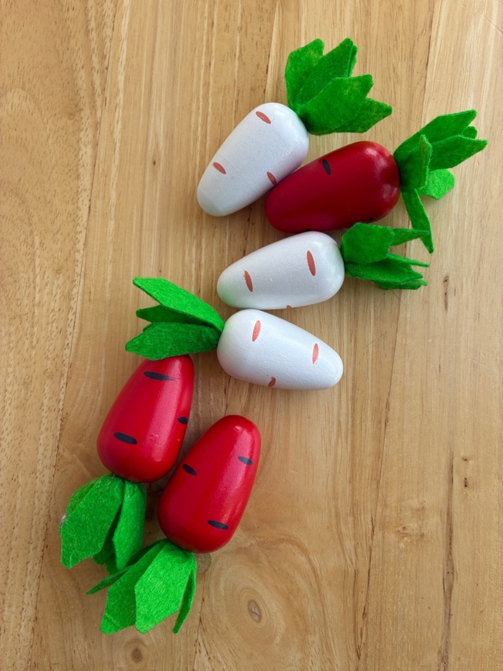 Wooden carrots  3 red 3 white. 3 inch